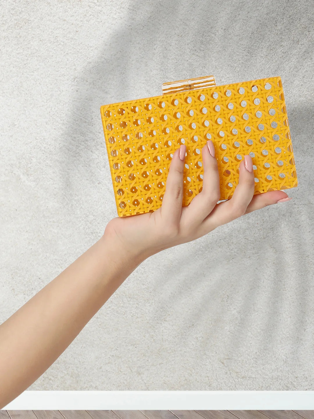 Small yellow top clutch bag