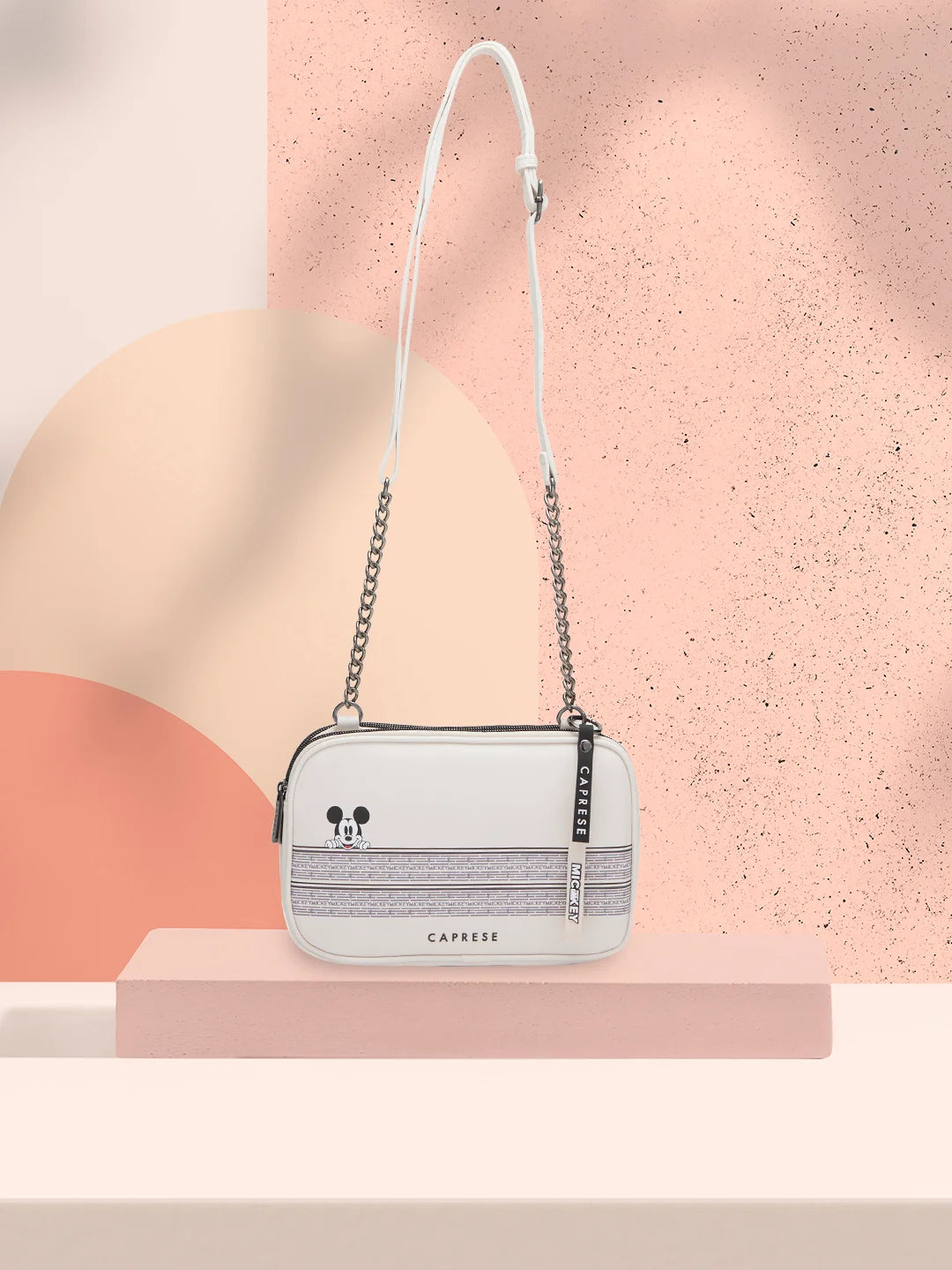 Caprese beige sling bag hotsell