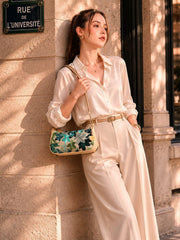 Caprese Riyo Medium Green Baguette Bag