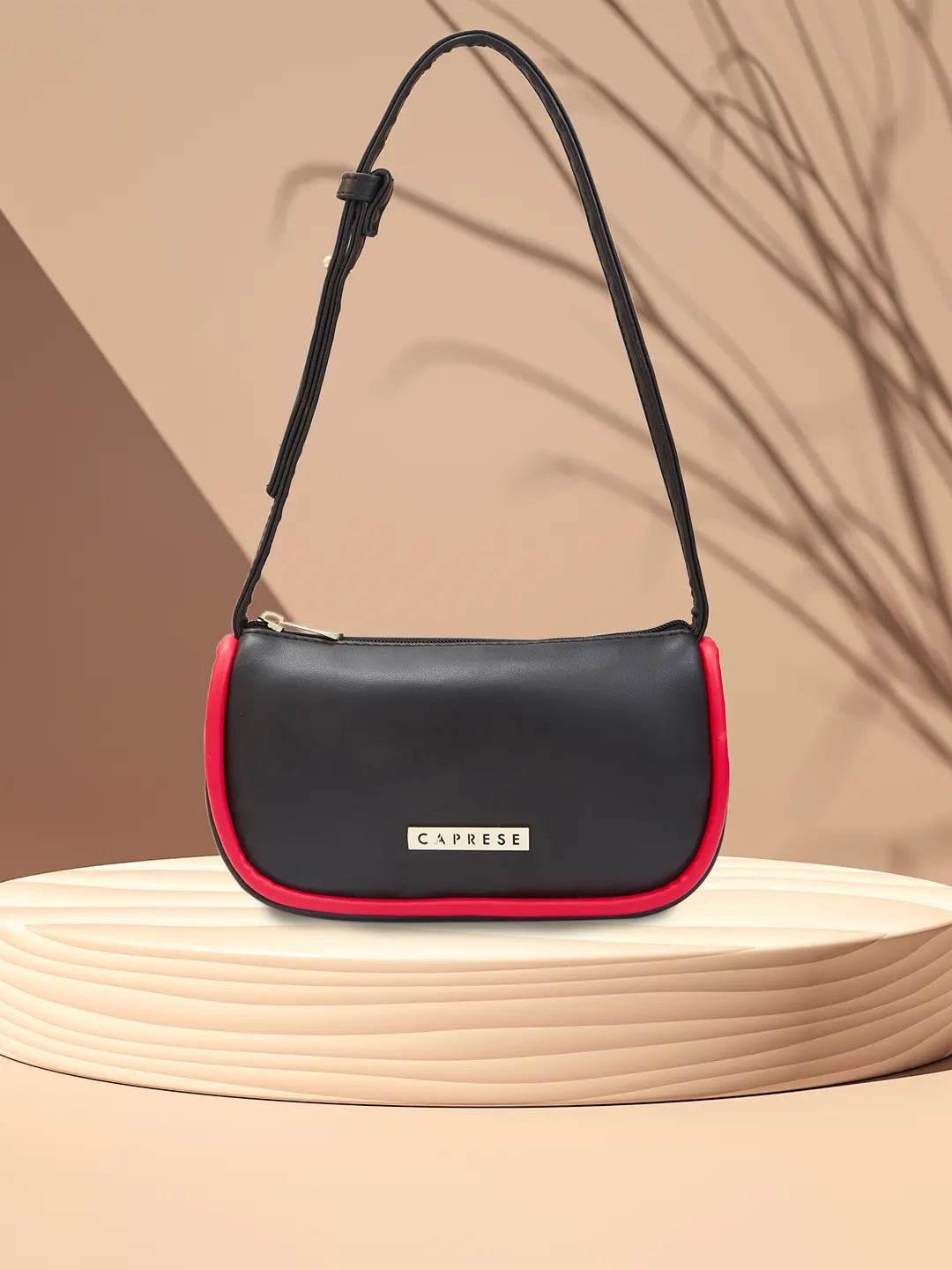 Caprese black solid handheld bag clearance