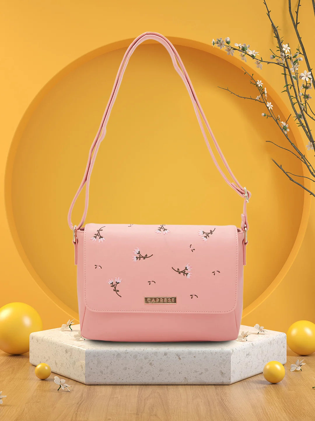 Caprese sling bags price hotsell