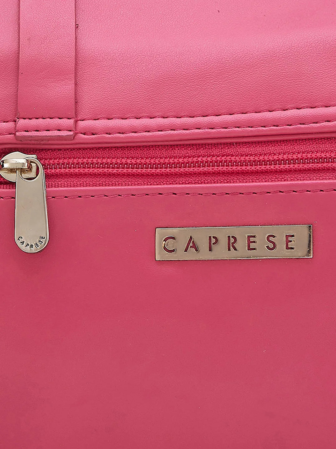 Caprese pink sales solid sling bag