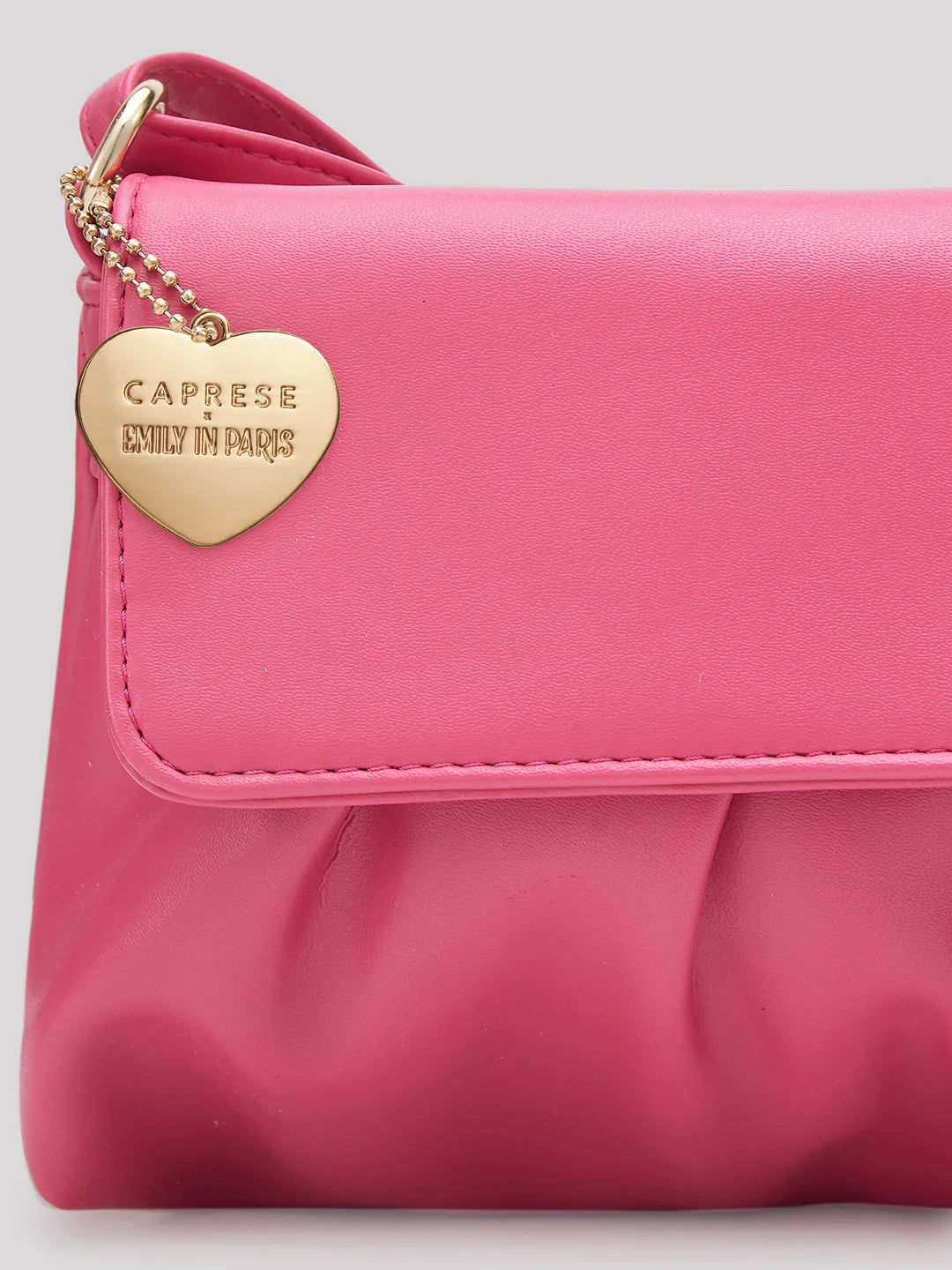 Caprese pink solid sling bag hot sale